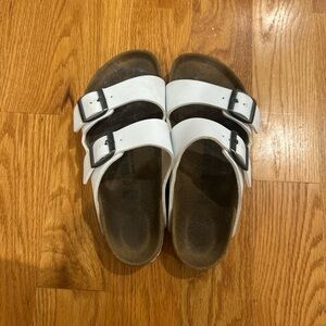 Birkenstock White Sandals with Black Buckles
